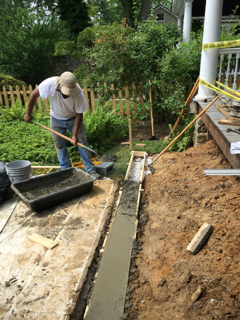 Pouring New Footer for Stairs during a Porch Remodel by John Neill Painting